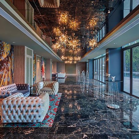 Hotel Angsana Teluk Bahang, Penang Batu Ferringhi Esterno foto The lobby of the hotel